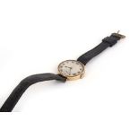 An 18ct yellow gold gentleman's wristwatch by Walker, the circular silvered dial with black Roman