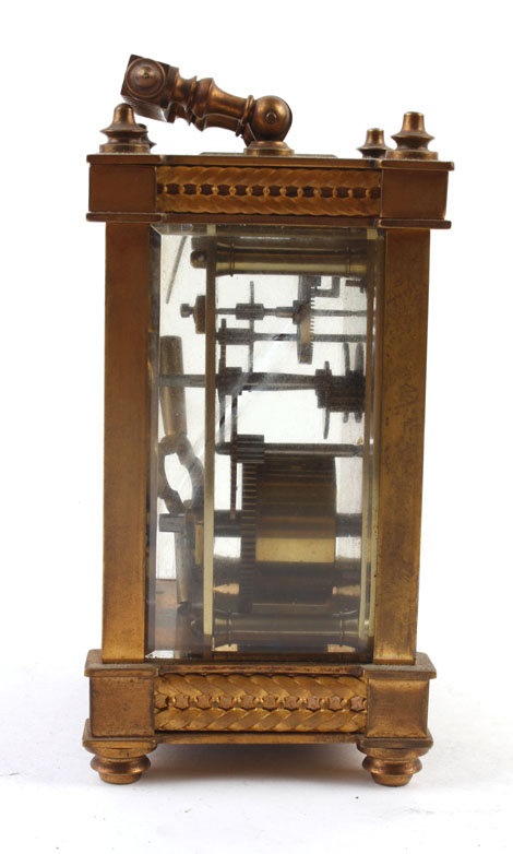 A 19th century carriage clock, the enamelled dial with Arabic numerals within a brass five-glass - Image 2 of 2