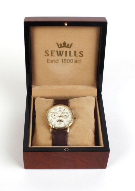 AMENDED A gentleman's 9ct gold 'Millennium Limited Edition' wristwatch by Sewills, the circular dial