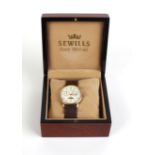 AMENDED A gentleman's 9ct gold 'Millennium Limited Edition' wristwatch by Sewills, the circular dial