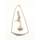 A 9ct yellow gold necklace, the pendant of winged design set diamonds and green coloured stones,