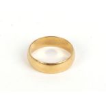 A 22ct yellow gold wedding band, 4.