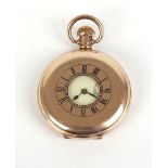 A gold plated half hunter pocket watch, the white enamel face with black Arabic numerals and