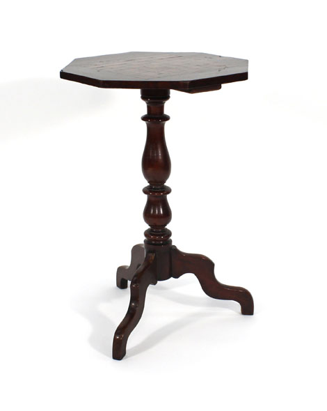 A 19th century mahogany table, the hexagonal top inlaid with a chessboard surface on a turned