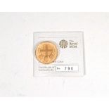 A Royal Mint 2010 London £1 gold proof coin, limited edition 790/1000,