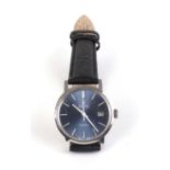 A stainless steel gentleman's automatic wristwatch by Omega, the pale blue dial with baton