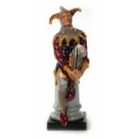 A Royal Doulton figure, 'The Jester', h. 25 cm CONDITION REPORT: PLEASE NOTE AMENDED CONDITION