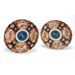 A pair of Imari-pattern side plates, d. 21.5 cm CONDITION REPORT: No obvious chips or cracks