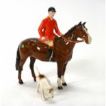 A Beswick huntsman on a brown horse, h. 20.5 cm, together with a hound CONDITION REPORT: Hound