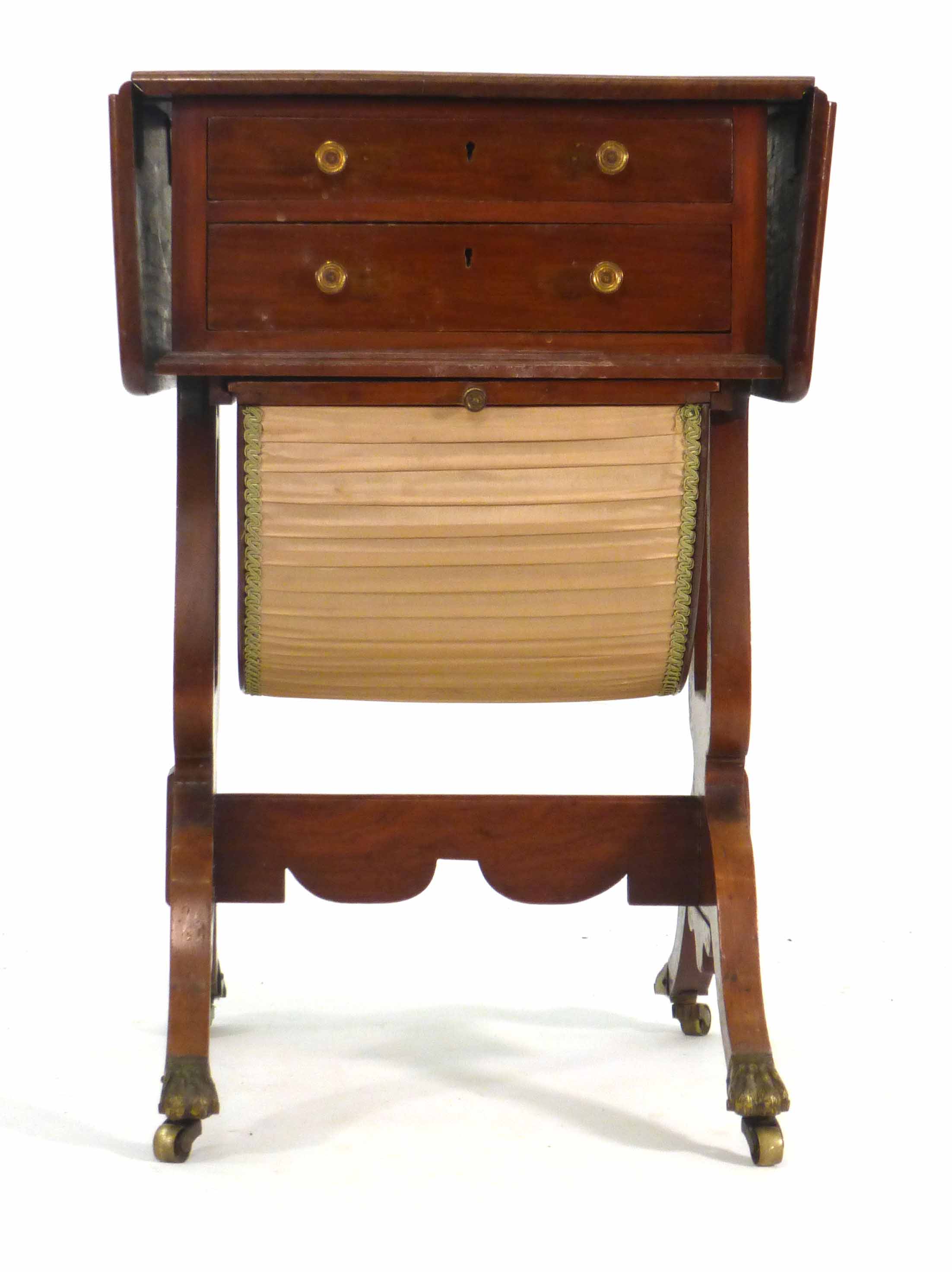 A 19th century mahogany sewing table, the drop leaf top over two fitted drawers and a basket on
