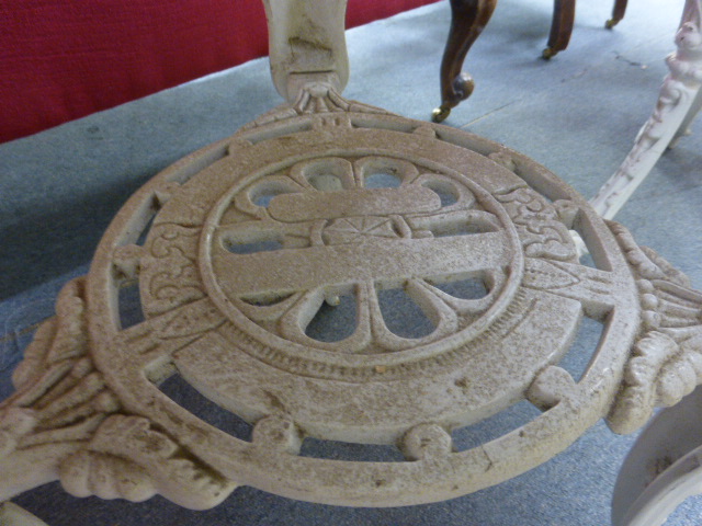 A late Victorian garden table, the mahogany circular top on a white cast iron base, the three legs - Image 8 of 15