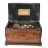 A 19th century rosewood and marquetry cylinder music box playing six airs, the winder labeled 5382,