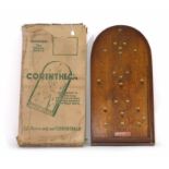 A 1960s/70s bagatelle board by 'Corinthian' in the original card case CONDITION REPORT: Wear