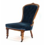 A late Victorian beech and button upholstered nursing chair on turned legs CONDITION REPORT: Wear