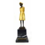 After Demetre H Chiparus, a bronze study of a female at ease, later overpainted, on a marble plinth,