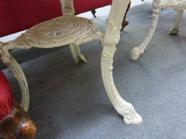 A late Victorian garden table, the mahogany circular top on a white cast iron base, the three legs - Image 10 of 15