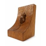 An oak 'Mouseman' bookend of curved form, h.