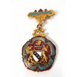 A 'Royal Masonic Institution for Boys' gilt metal and enameled Stewards jewel by George Kenning &