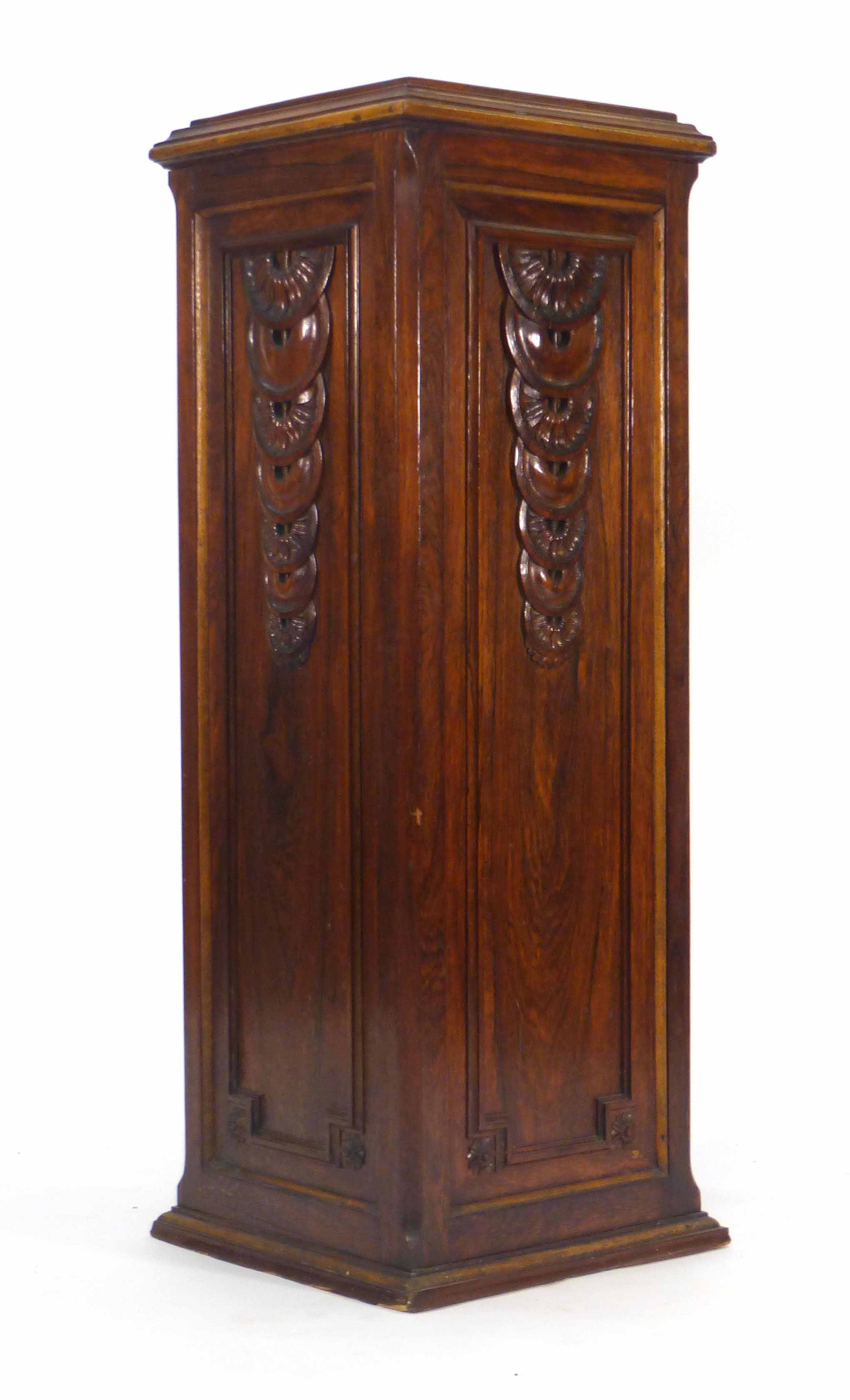 A Victorian rosewood jardiniere of square canted form with circular sunflower motifs, h. 101 cm