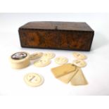 Withdrawn: A 19th century pen work box containing a quantity of 19th century ivory escutcheons and