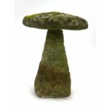 A granite saddle stone, h.