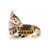 A Royal Crown Derby paperweight in the form of a seated donkey, h.