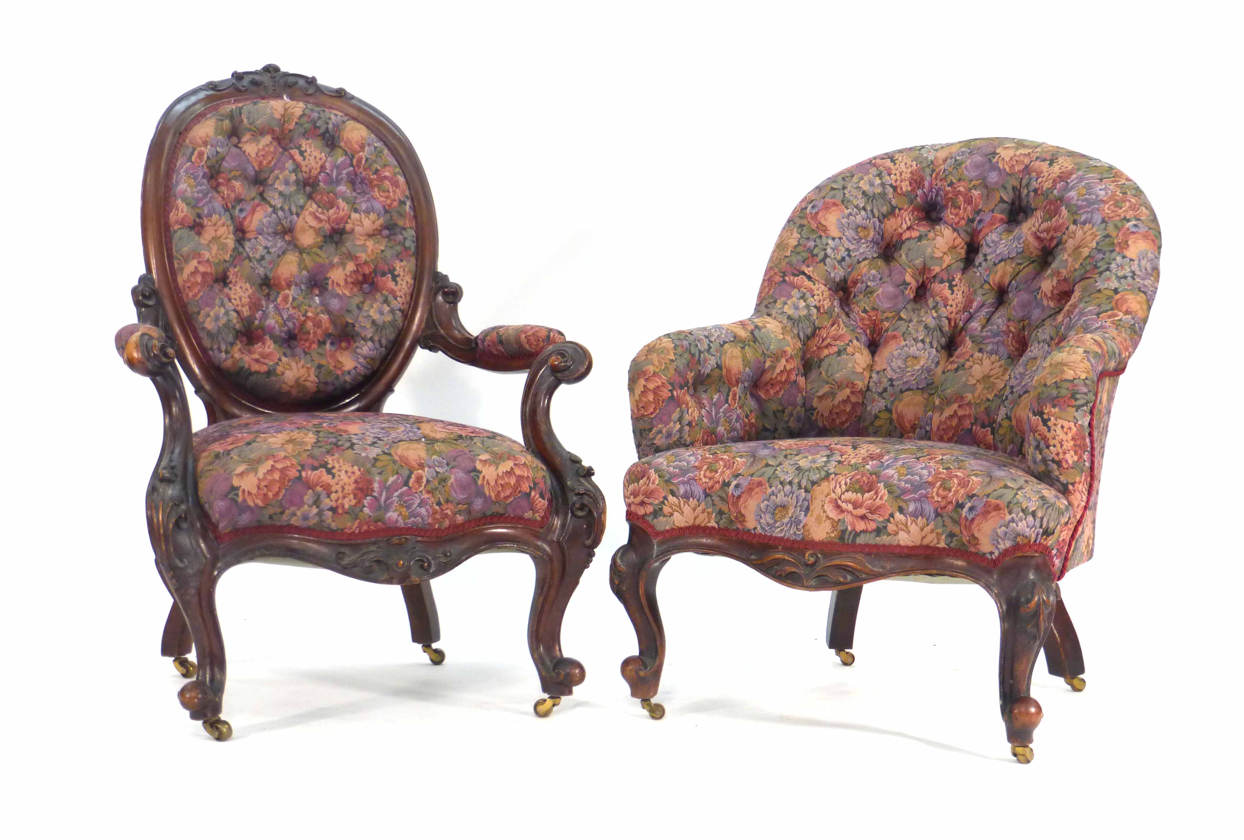 A Victorian mahogany and button upholstered armchair on scrolled feet together with a similar button