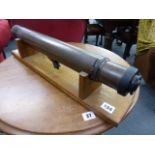 A 20th century tole telescope by Watson & Sons Ltd. mounted on an oak stand, l.