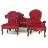 A Victorian mahogany and button upholstered chaise longue together with a matching armchair and