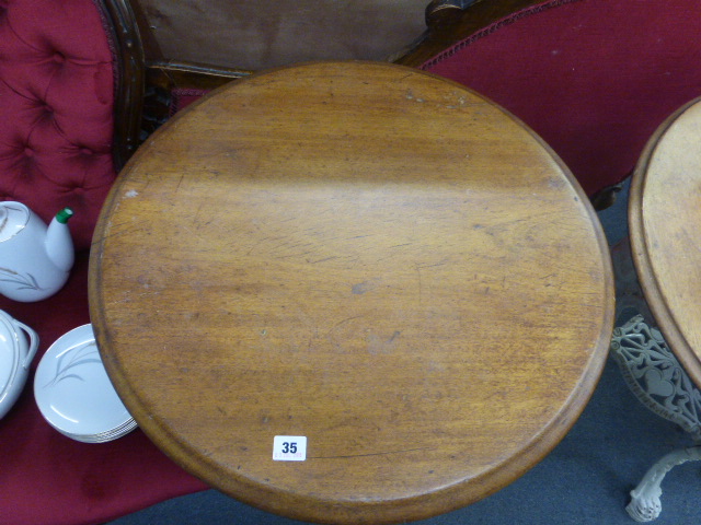 A late Victorian garden table, the mahogany circular top on a white cast iron base, the three legs - Image 14 of 15