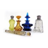 A clear glass and metalwares mounted perfume bottle together with a lemon glass and metalwares