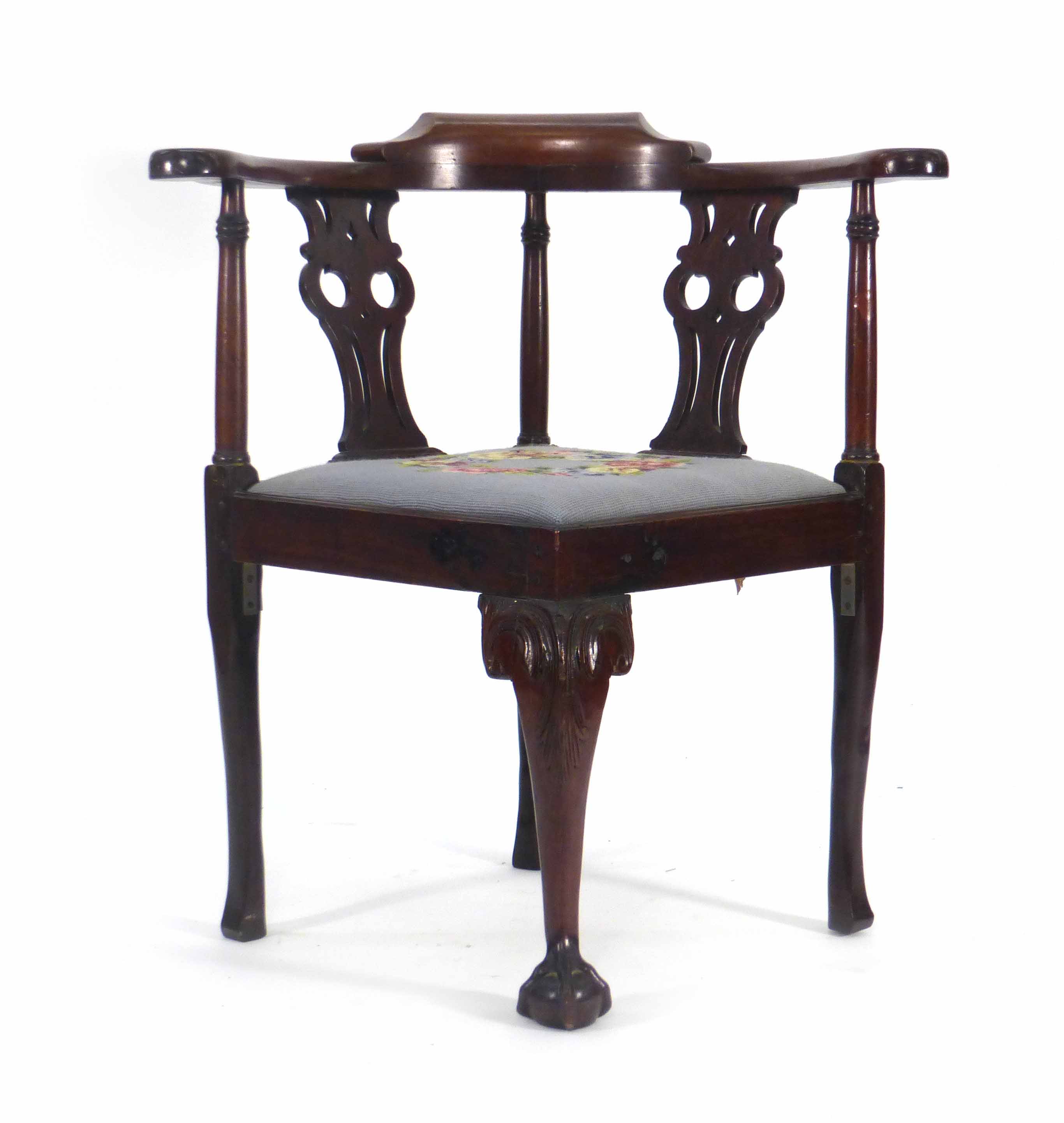 A Victorian mahogany and upholstered corner armchair of typical form CONDITION REPORT: Wear