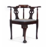 A Victorian mahogany and upholstered corner armchair of typical form CONDITION REPORT: Wear