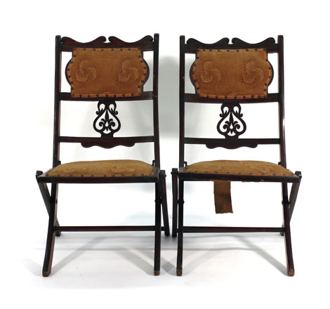 A set of four Edwardian beech and upholstered campaign-type folding chairs CONDITION REPORT: