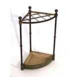 An early 20th century brass and cast metal corner stick stand, h. 62 cm CONDITION REPORT: Pitting