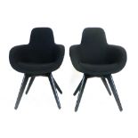 A pair of 'Scoop High' black fabric armchairs on tapering feet by Tom Dixon  CONDITION REPORT: