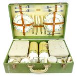 A 1960's Sirram thermos picnic set in a green card case, l. 48 cm CONDITION REPORT: Wear