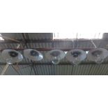 A set of five black enamelled ceiling lights with steel grills and moulded glass shades CONDITION