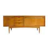 A White & Newton teak sideboard with two sliding doors, three drawers and one door on circular