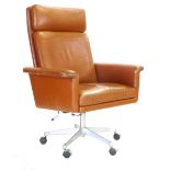 A 1970's tan leather highbacked swivel office chair on an aluminium five star base by Kado CONDITION