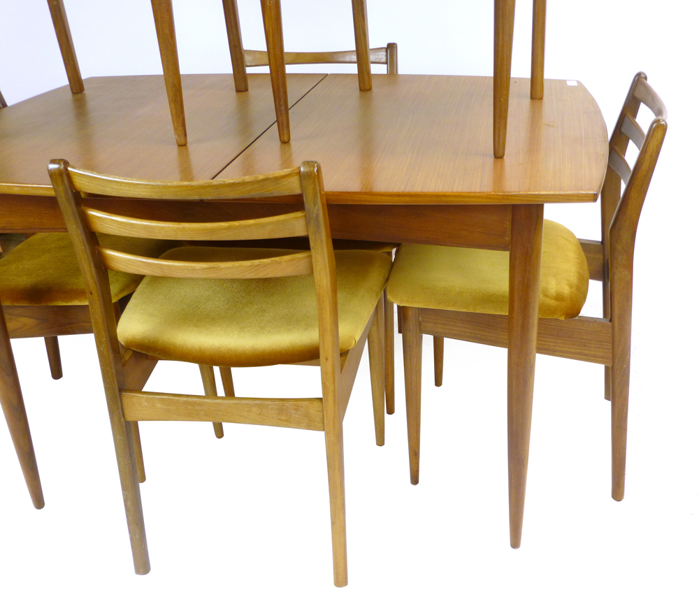 A British 1960's teak extending dining table of boat form, max l. 165 cm, together with six matching - Image 2 of 2