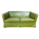 A green leather two seater sofa on beech square straight legs  CONDITION REPORT: Some marks to seats
