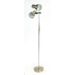 A 1970's twin spot standard lamp on an aluminium shaft CONDITION REPORT: Working order unknown,