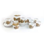 Susie Cooper for Wedgwood, a 'Reverie' six sitting tea service decorated with brown floral sprays