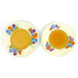 Clarice Cliff for Newport Pottery, two 'Crocus' pattern plates, d. 15.5 cm and 16 cm CONDITION