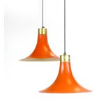 A pair of 1970's orange and white enamelled and brass coloured ceiling lights of trumpet form