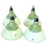 A set of four CCCP green and white enamelled ceiling lights with moulded glass shades  CONDITION