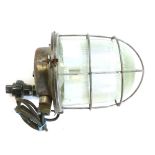 A 1970's Russian squat industrial lamp with steel grill and moulded glass shade CONDITION REPORT: