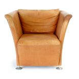 A modern tan leather club-style armchair on aluminium feet CONDITION REPORT: Wear to arms and