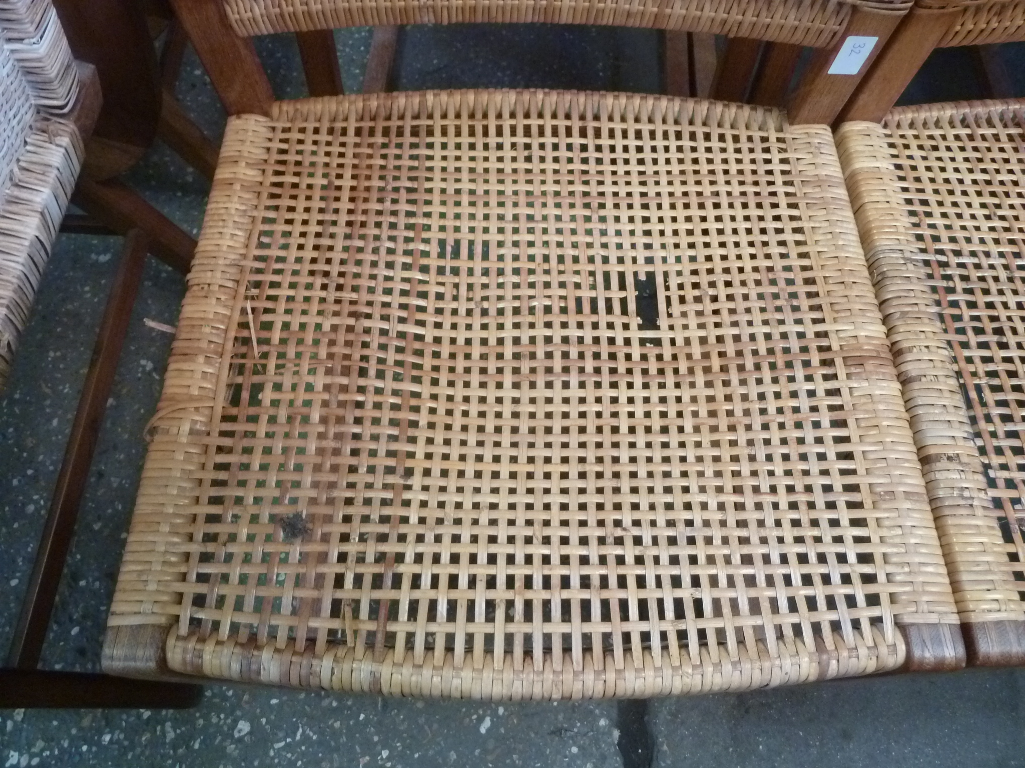 A set of six oak framed and wicker seated dining chairs on boxed supports CONDITION REPORT: - Image 2 of 10